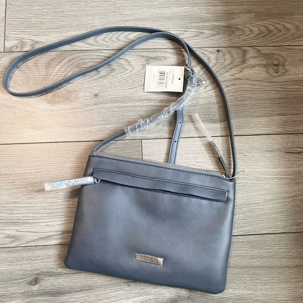 NWT- Roots vegan grey cross body bag 9.5”X 7”